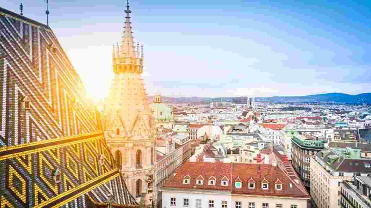 Aerial view over the rooftops of Vienna, including St. Stephen's Cathedral.